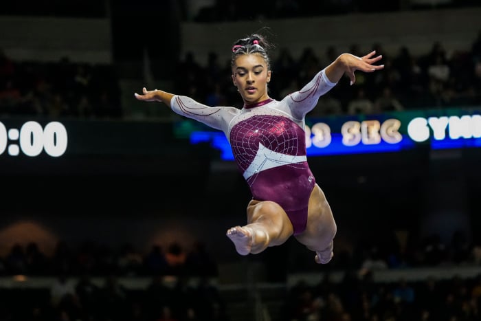 Alabama Crimson Tide gymnast Luisa Blanco competes on the balance beam during the SEC Gymnastics Championship at Gas South Arena.